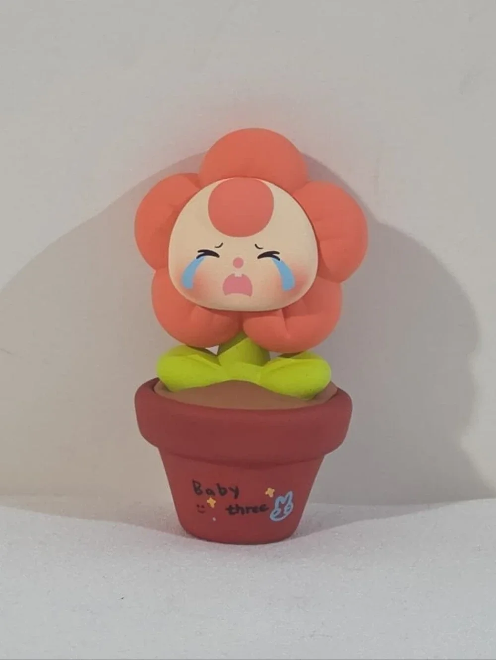 Baby Three crying flower mini figure